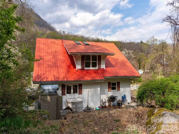 a view of a cafe with sitting area