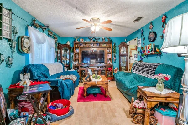 a room with lots of furniture and toys