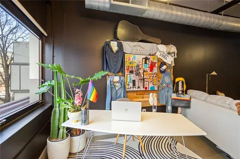 a living room with furniture and a table