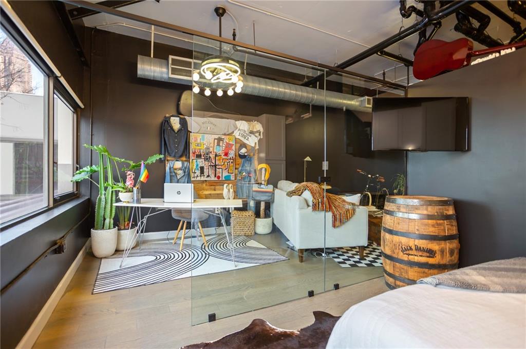 120 Ralph McGill Boulevard Northeast, Unit 405 Atlanta, GA 30308 - Photo 15 of 32 a view of a dining room with furniture