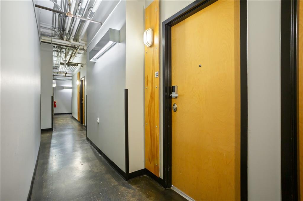 120 Ralph McGill Boulevard Northeast, Unit 405 Atlanta, GA 30308 - Photo 18 of 32 a view of hallway with stairs