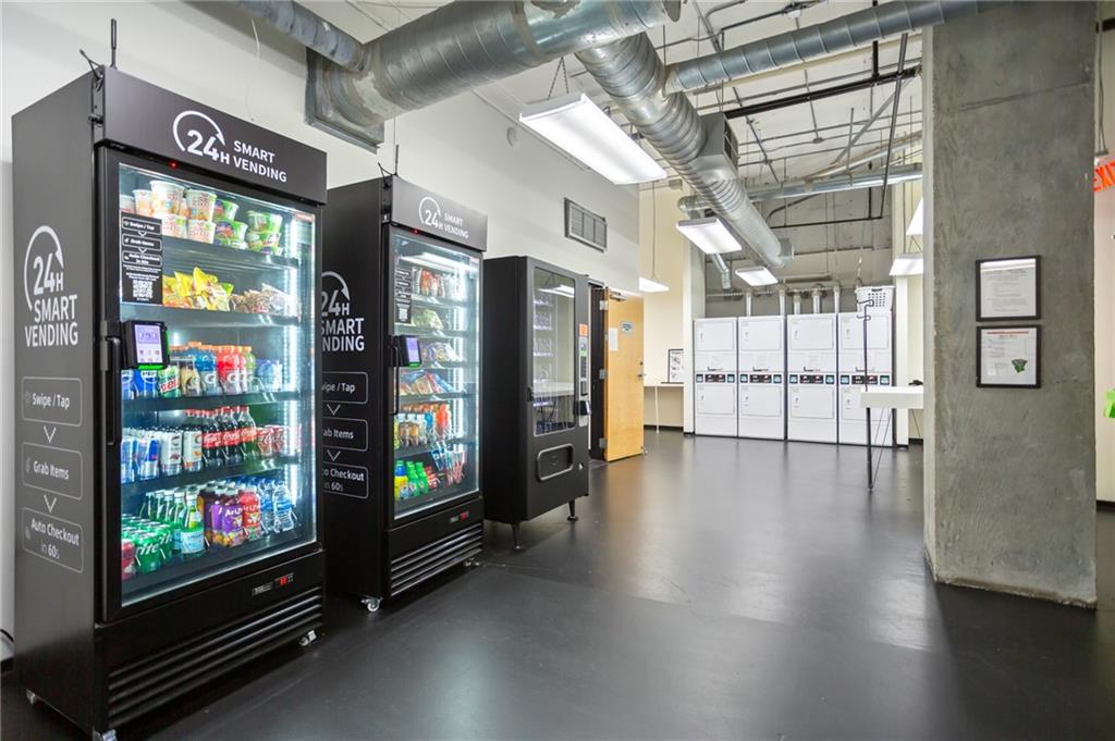 120 Ralph McGill Boulevard Northeast, Unit 405 Atlanta, GA 30308 - Photo 20 of 32 a view of lobby with furniture and flat screen tv