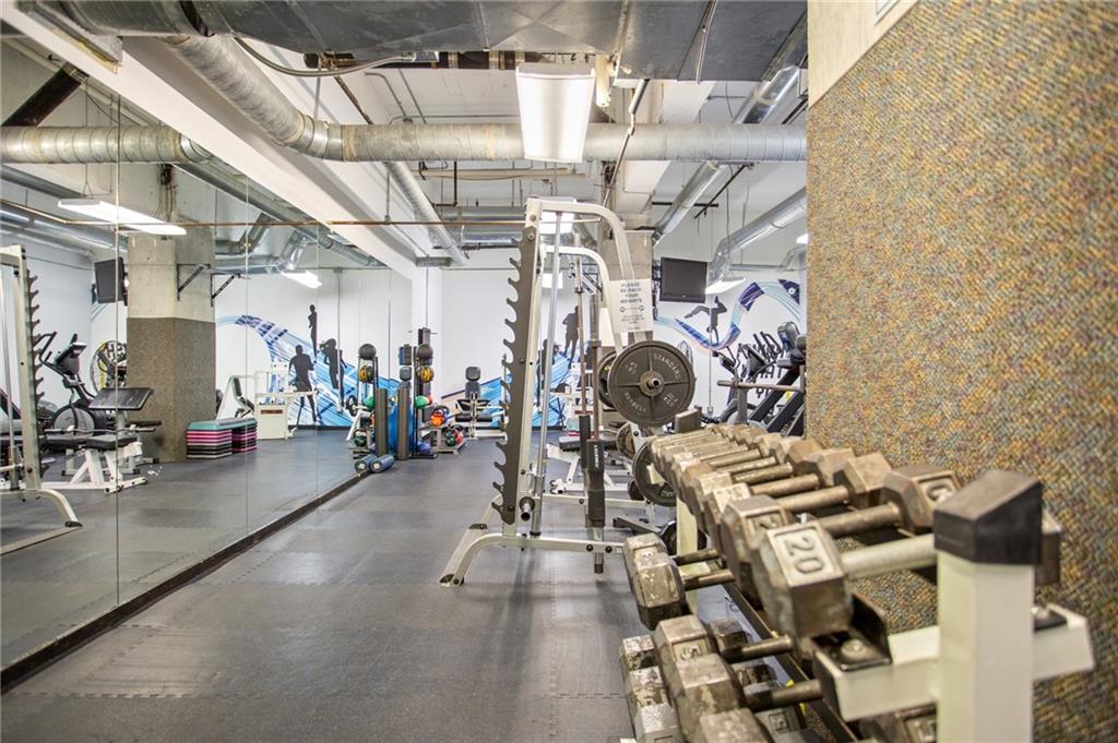 120 Ralph McGill Boulevard Northeast, Unit 405 Atlanta, GA 30308 - Photo 21 of 32 a view of a room with gym equipment