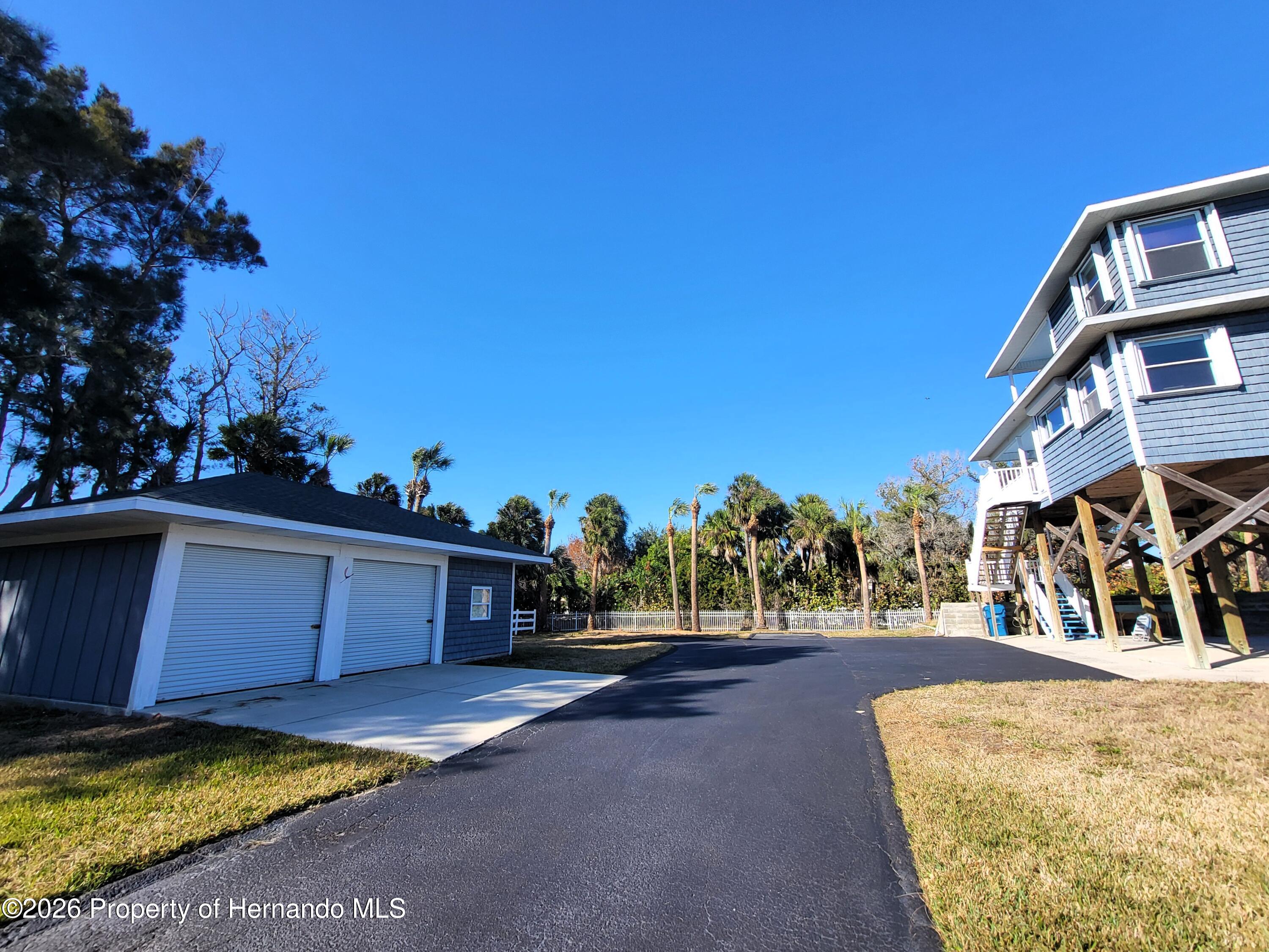 3461 Pandora Drive Weeki Wachee, FL 34607 - Photo 46 of 61 Spacious Black-top Driveway