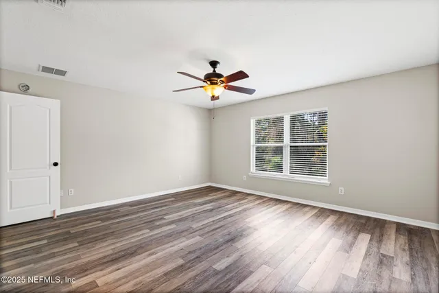 a view of a room with racks on the wall