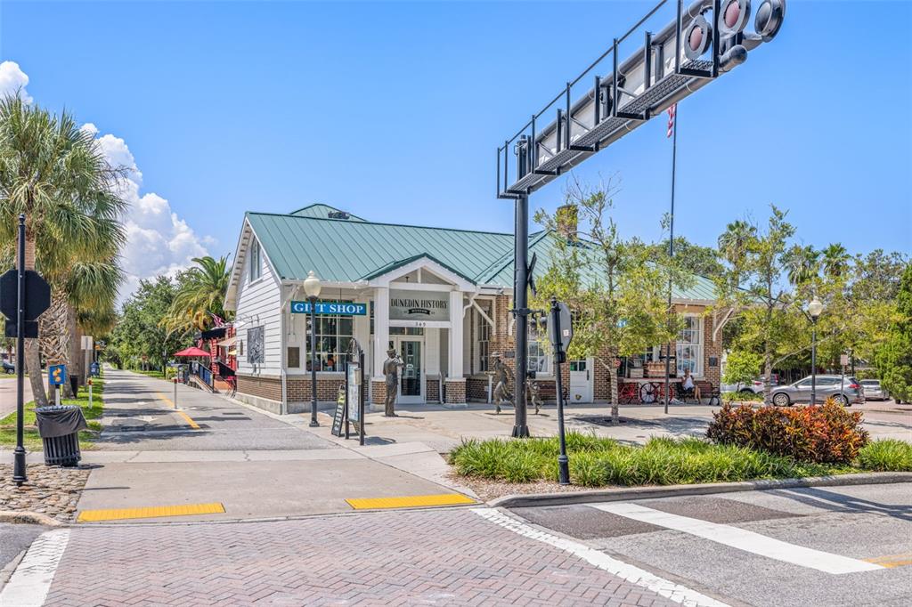 1370 Heather Ridge Boulevard, Unit 105 Dunedin, FL 34698 - Photo 40 of 56 a view of a street with houses