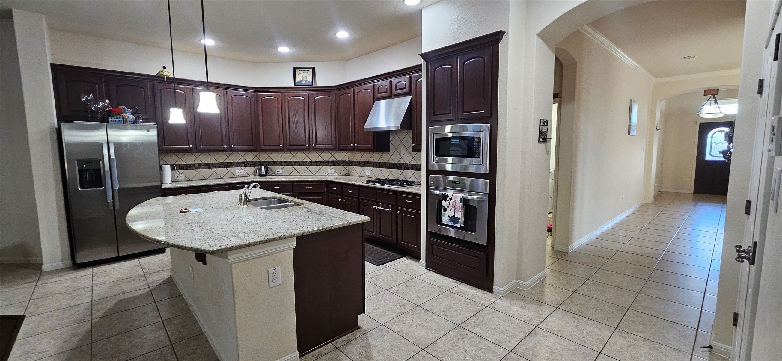 116 Azimuth Drive Austin, TX 78717 - Photo 24 of 33 a kitchen with a refrigerator and countertop