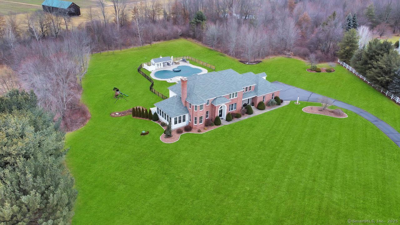 65 Thistledown Suffield, CT 06078 - Photo 1 of 40 a view of yard with green space