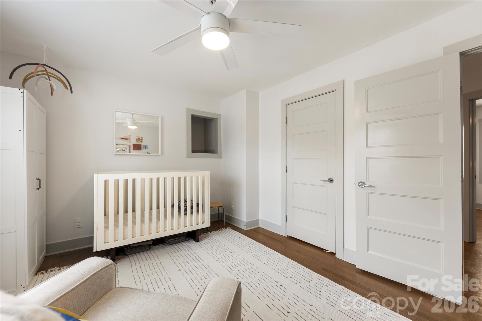 6229 Springfield Drive Charlotte, NC 28212 - Photo 17 of 44 a bedroom with a bed and a bathroom