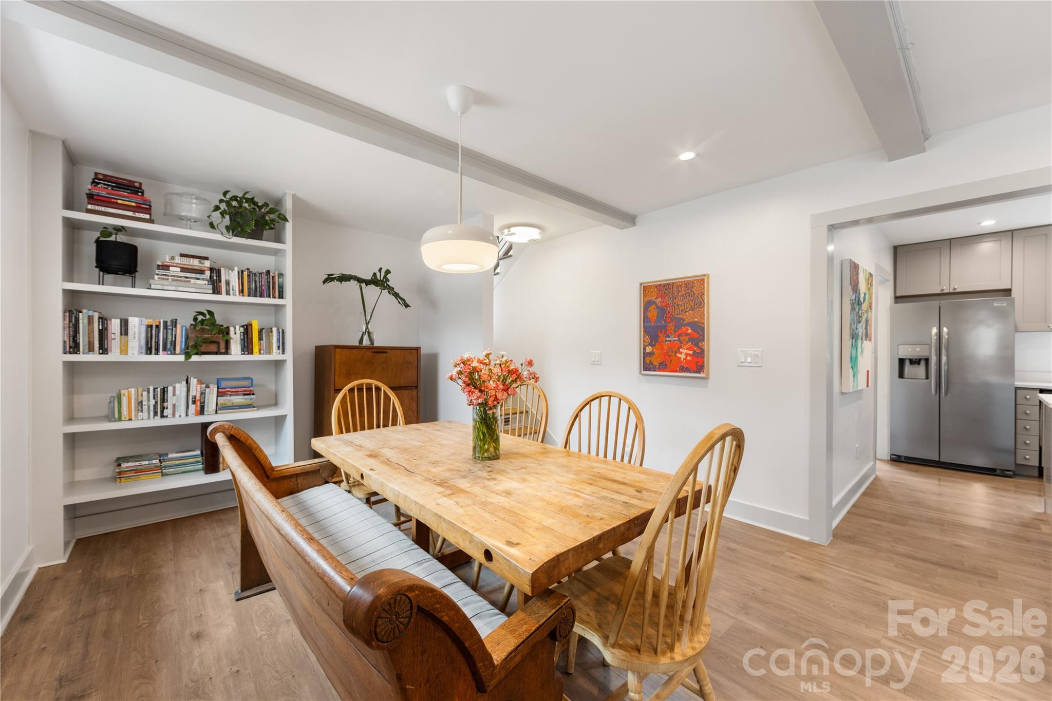 6229 Springfield Drive Charlotte, NC 28212 - Photo 23 of 44 a view of a dining room with furniture and wooden floor