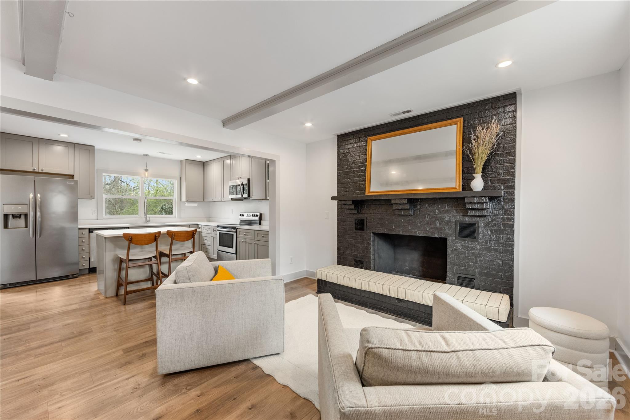 6229 Springfield Drive Charlotte, NC 28212 - Photo 24 of 44 a living room with furniture and a fireplace