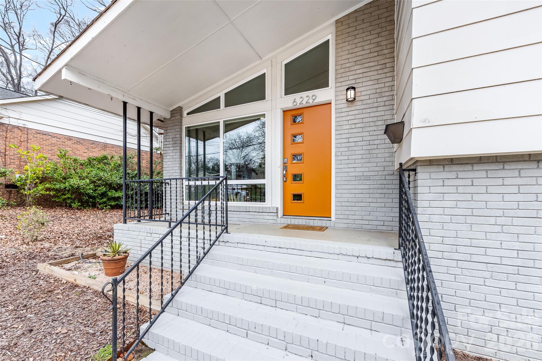 6229 Springfield Drive Charlotte, NC 28212 - Photo 3 of 44 a view of a house with a porch