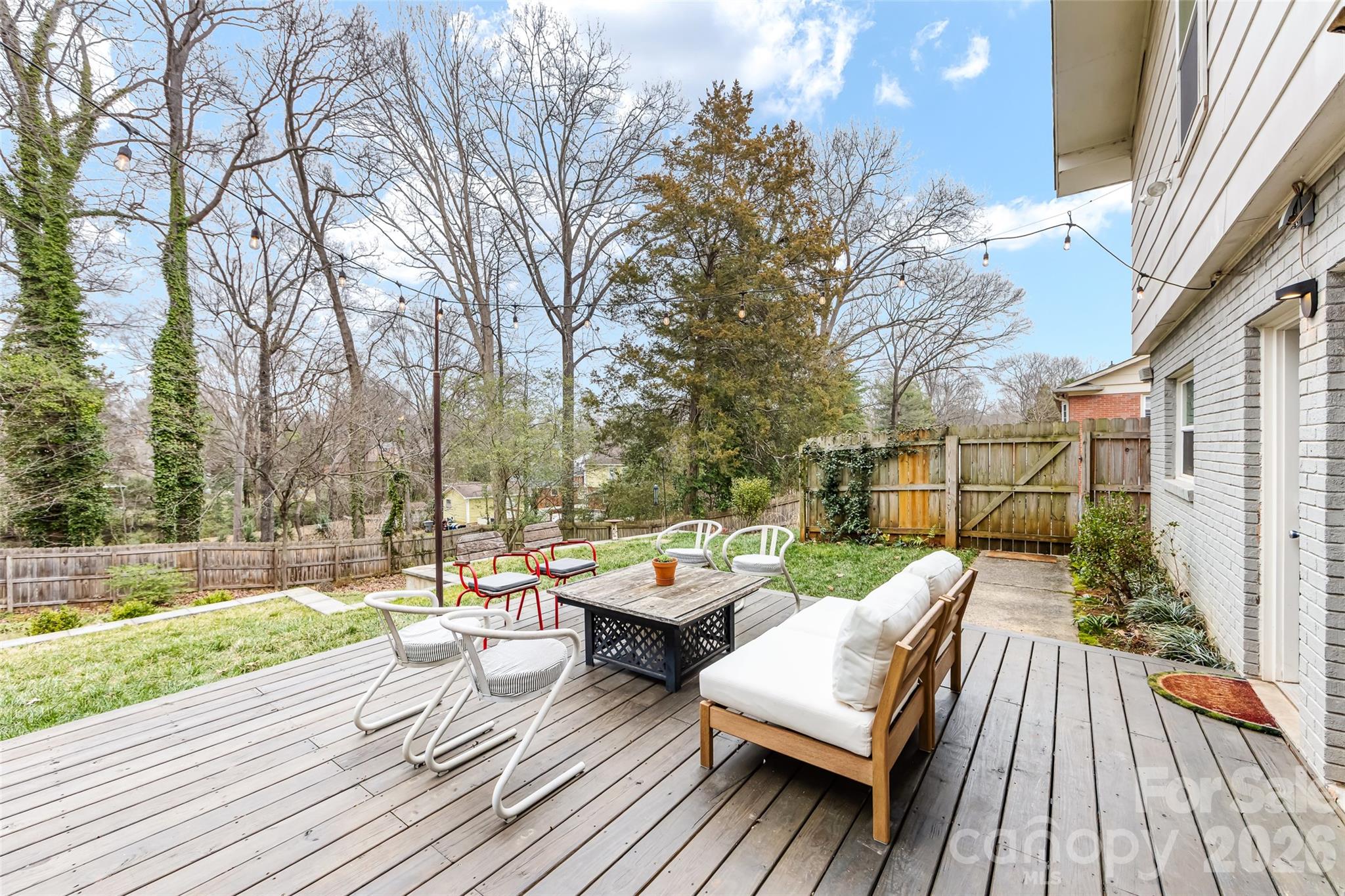 6229 Springfield Drive Charlotte, NC 28212 - Photo 37 of 44 a view of a deck with couches wooden floor and outdoor space