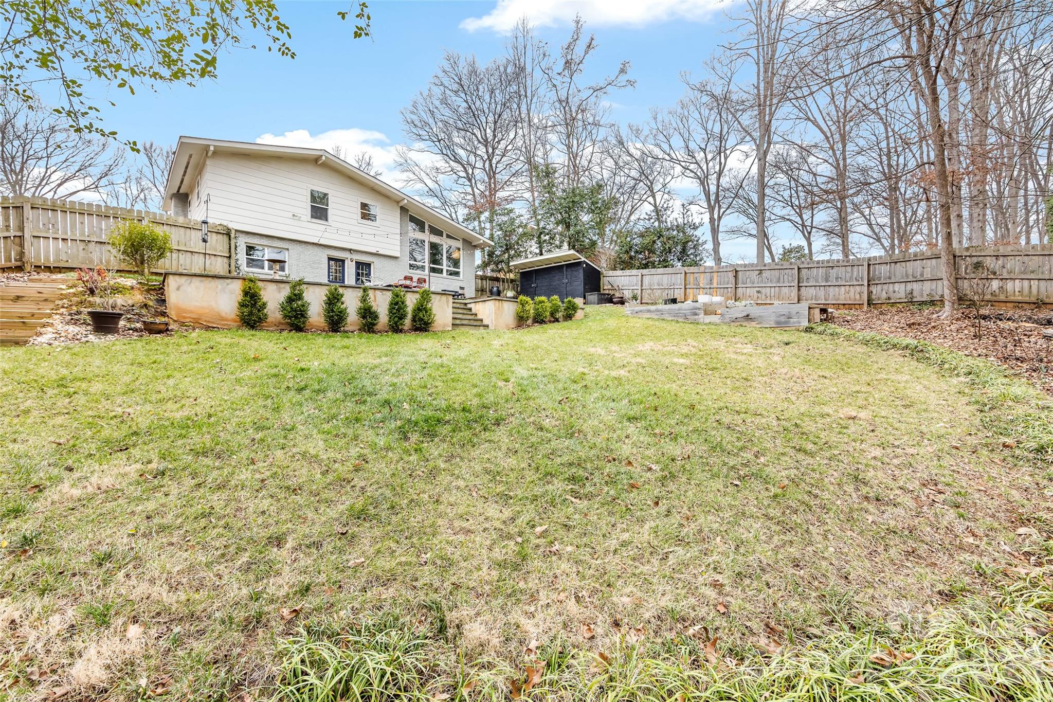 6229 Springfield Drive Charlotte, NC 28212 - Photo 40 of 44 a front view of a house with a yard
