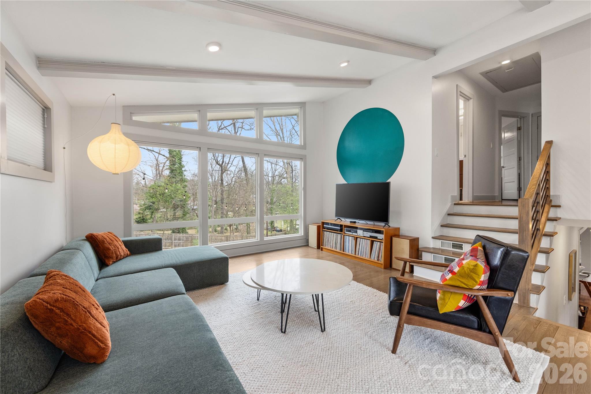 6229 Springfield Drive Charlotte, NC 28212 - Photo 6 of 44 a living room with furniture and a large window
