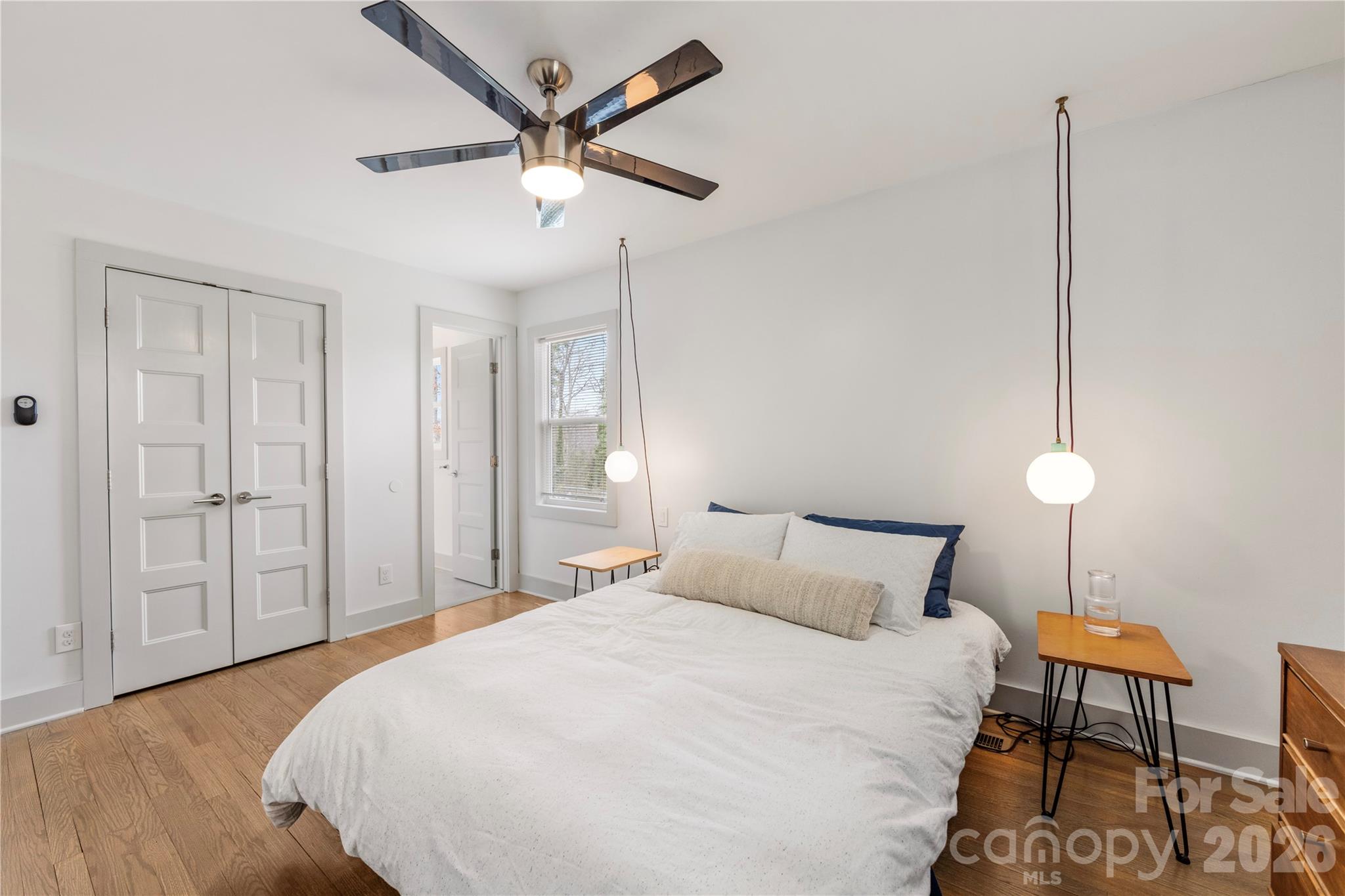 6229 Springfield Drive Charlotte, NC 28212 - Photo 10 of 44 a bedroom with a bed and a table