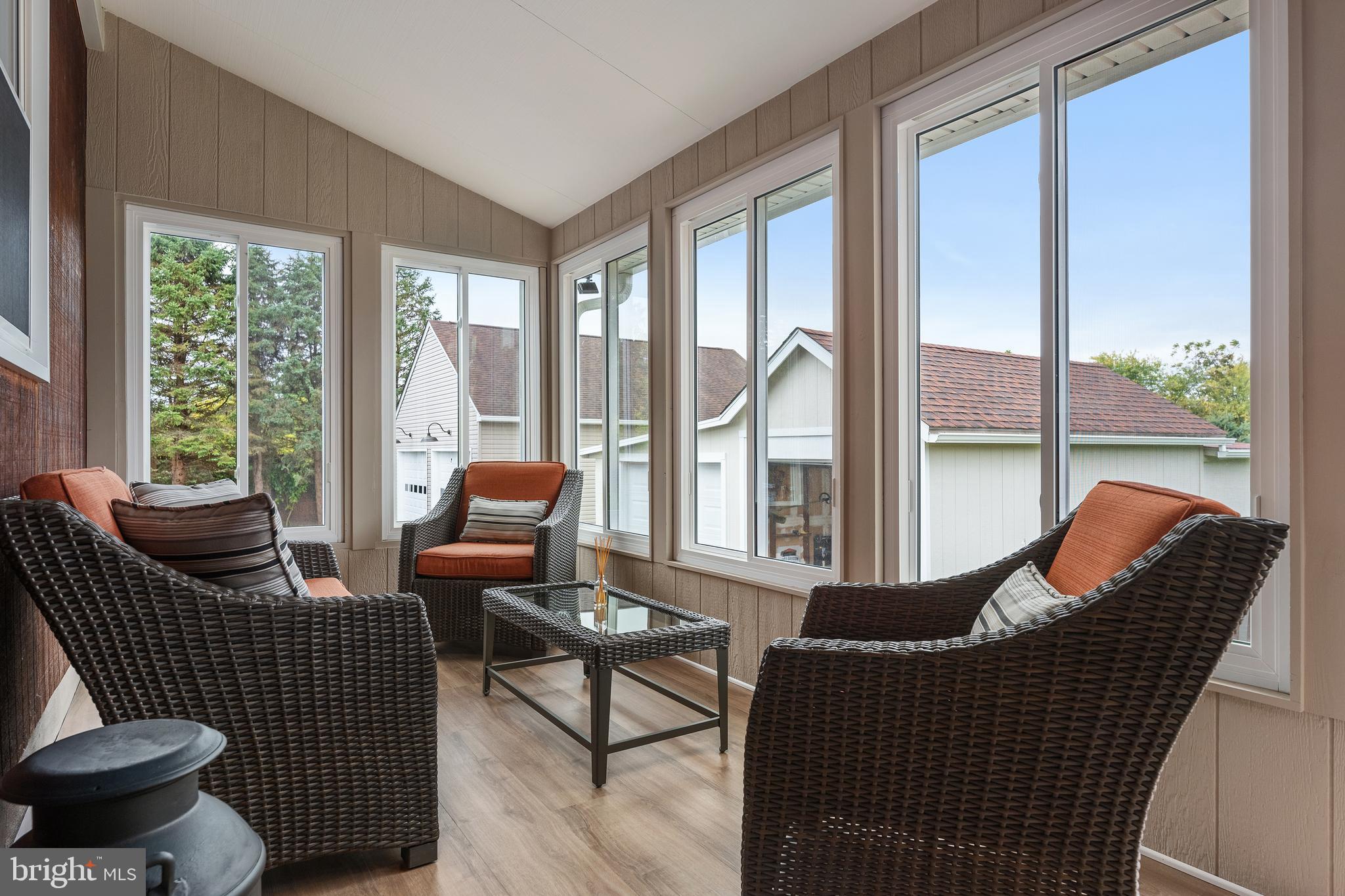758 North Houcksville Road Hampstead, MD 21074 - Photo 16 of 43 a living room with furniture and a floor to ceiling window