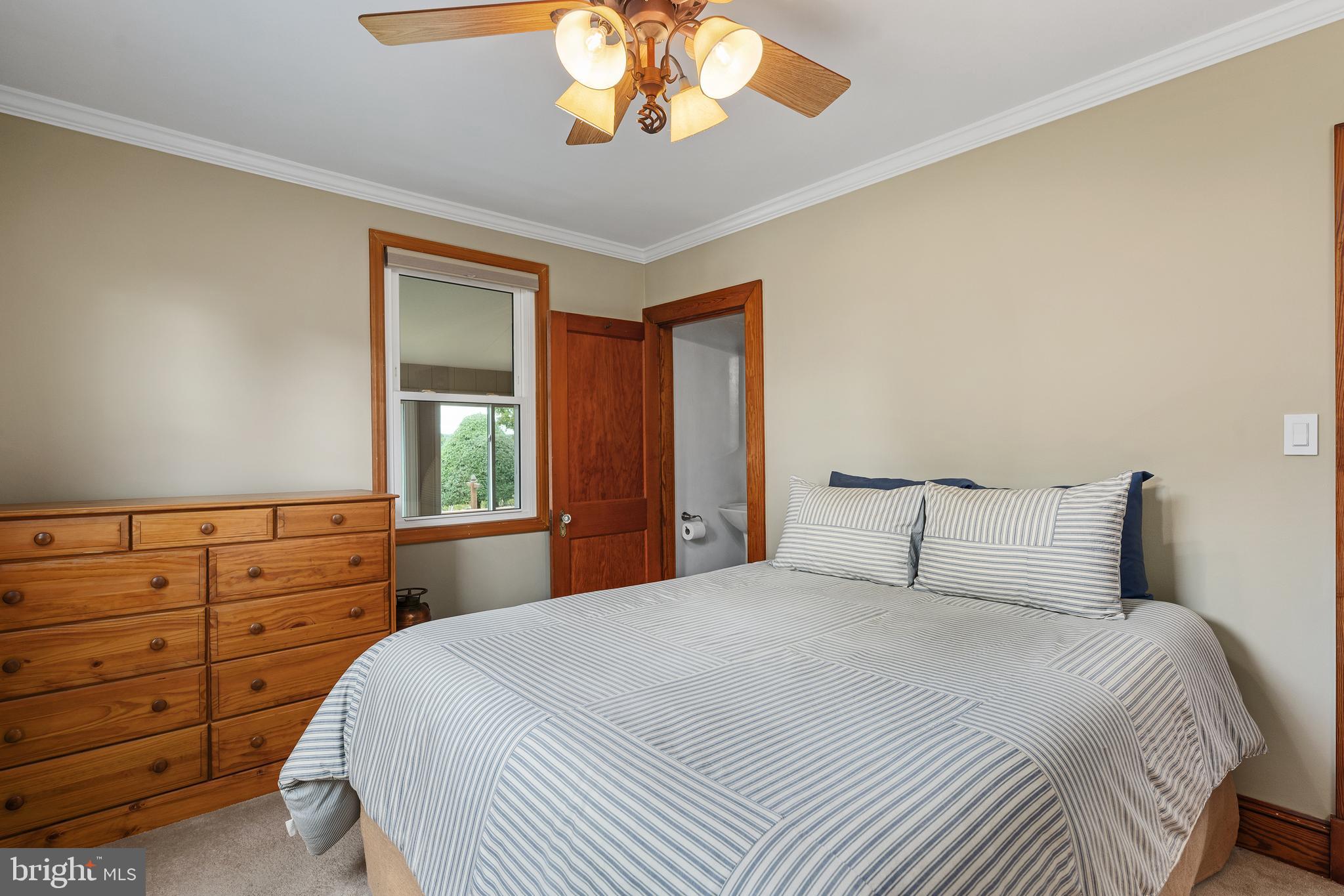 758 North Houcksville Road Hampstead, MD 21074 - Photo 21 of 43 a bedroom with a bed and a window