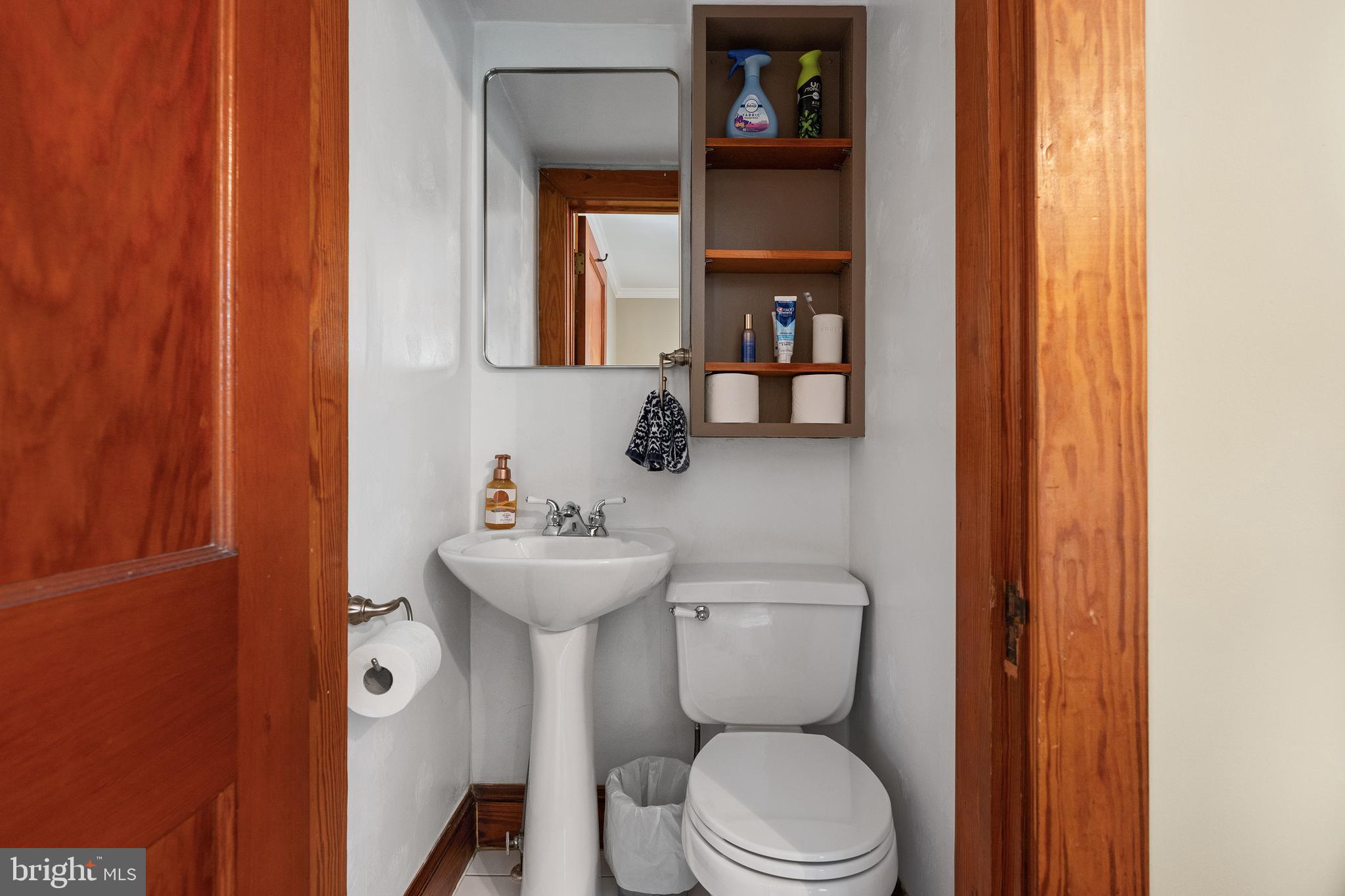 758 North Houcksville Road Hampstead, MD 21074 - Photo 22 of 43 a bathroom with a toilet a sink and mirror