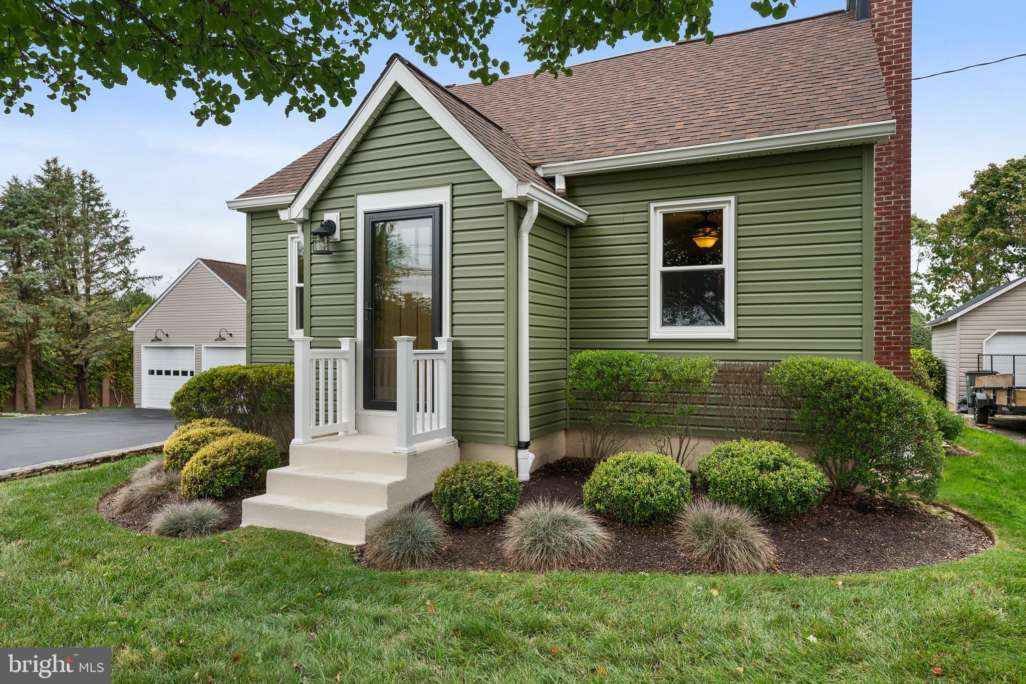 758 North Houcksville Road Hampstead, MD 21074 - Photo 3 of 43 a view of a house with a yard and plants