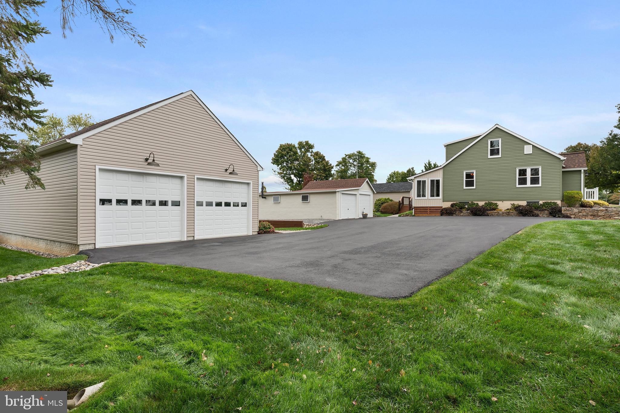 758 North Houcksville Road Hampstead, MD 21074 - Photo 37 of 43 a view of a house with a yard and a garage