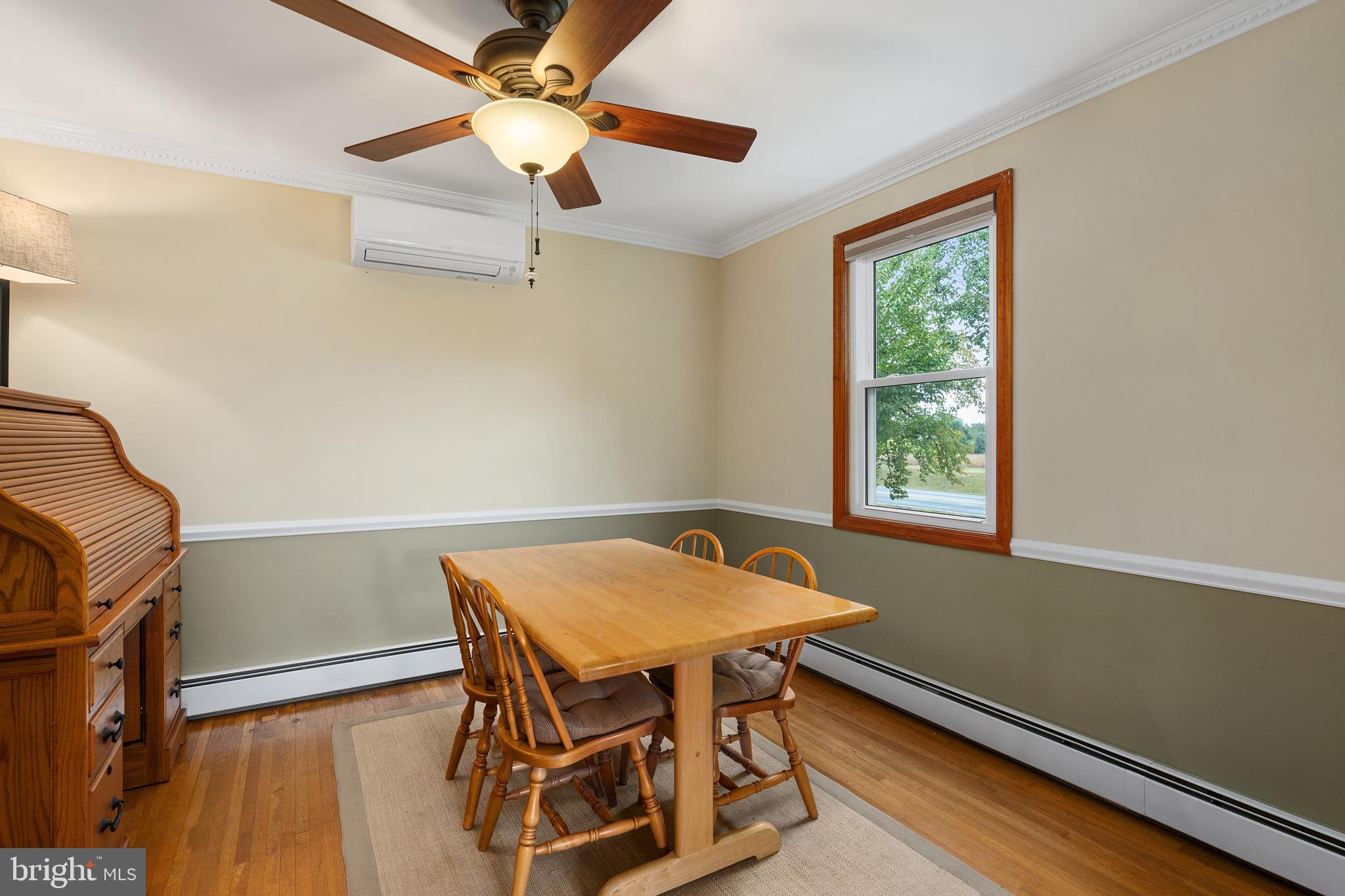 758 North Houcksville Road Hampstead, MD 21074 - Photo 8 of 43 a view of a dining room with furniture and a window