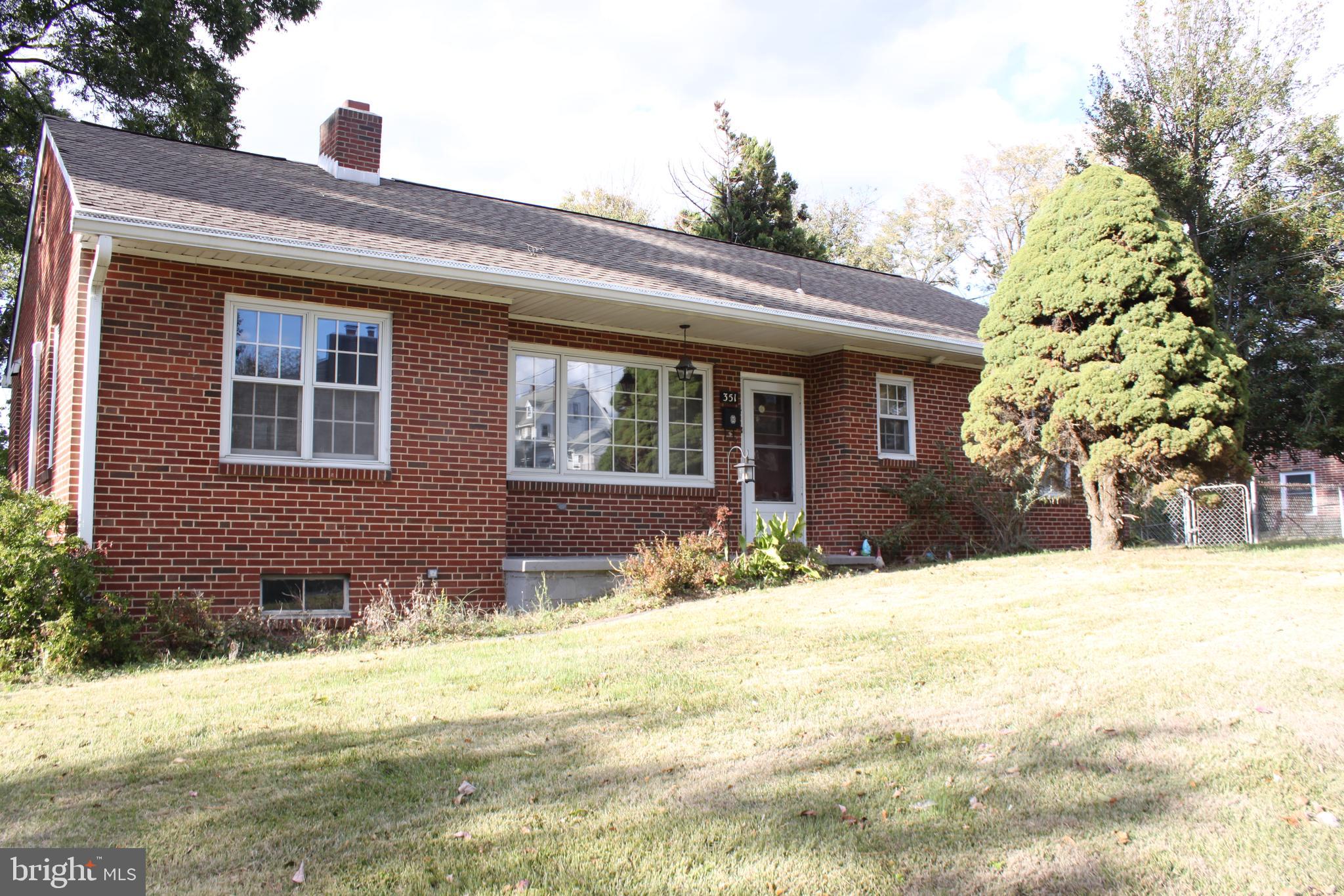 351 Catherine Street Steelton, PA 17113 - Photo 4 of 15 a front view of house with yard