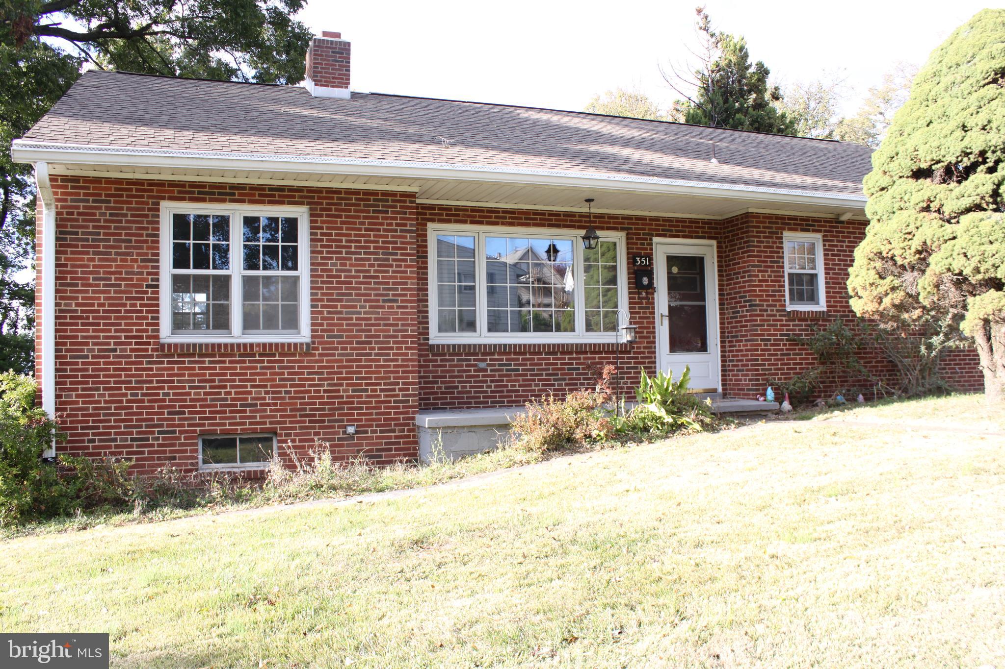 351 Catherine Street Steelton, PA 17113 - Photo 5 of 15 a front view of a house having a yard
