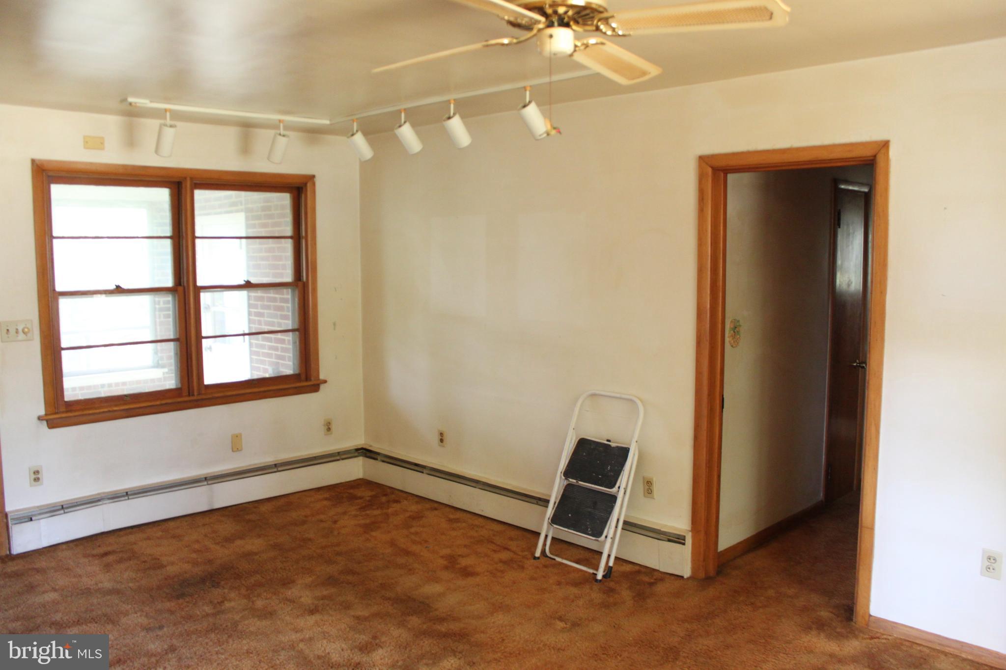 351 Catherine Street Steelton, PA 17113 - Photo 9 of 15 a view of an empty room with a window