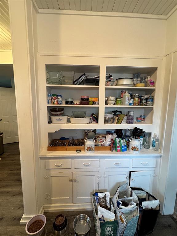 2300 Lyle Avenue Waco, TX 76708 - Photo 11 of 23 a shelf with water heater and racks on the wall