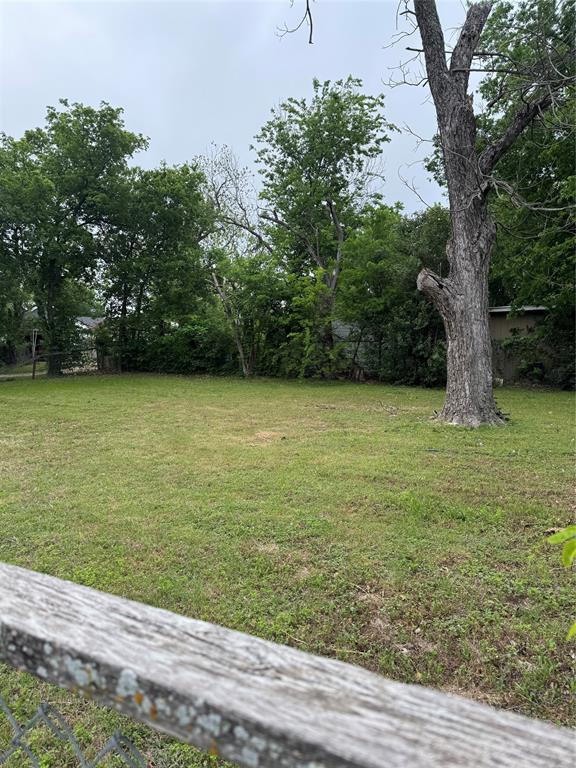 2300 Lyle Avenue Waco, TX 76708 - Photo 3 of 23 a view of a garden with a tree