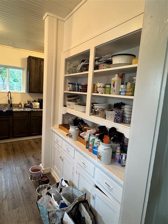 2300 Lyle Avenue Waco, TX 76708 - Photo 10 of 23 a kitchen with stainless steel appliances a stove and wooden floor