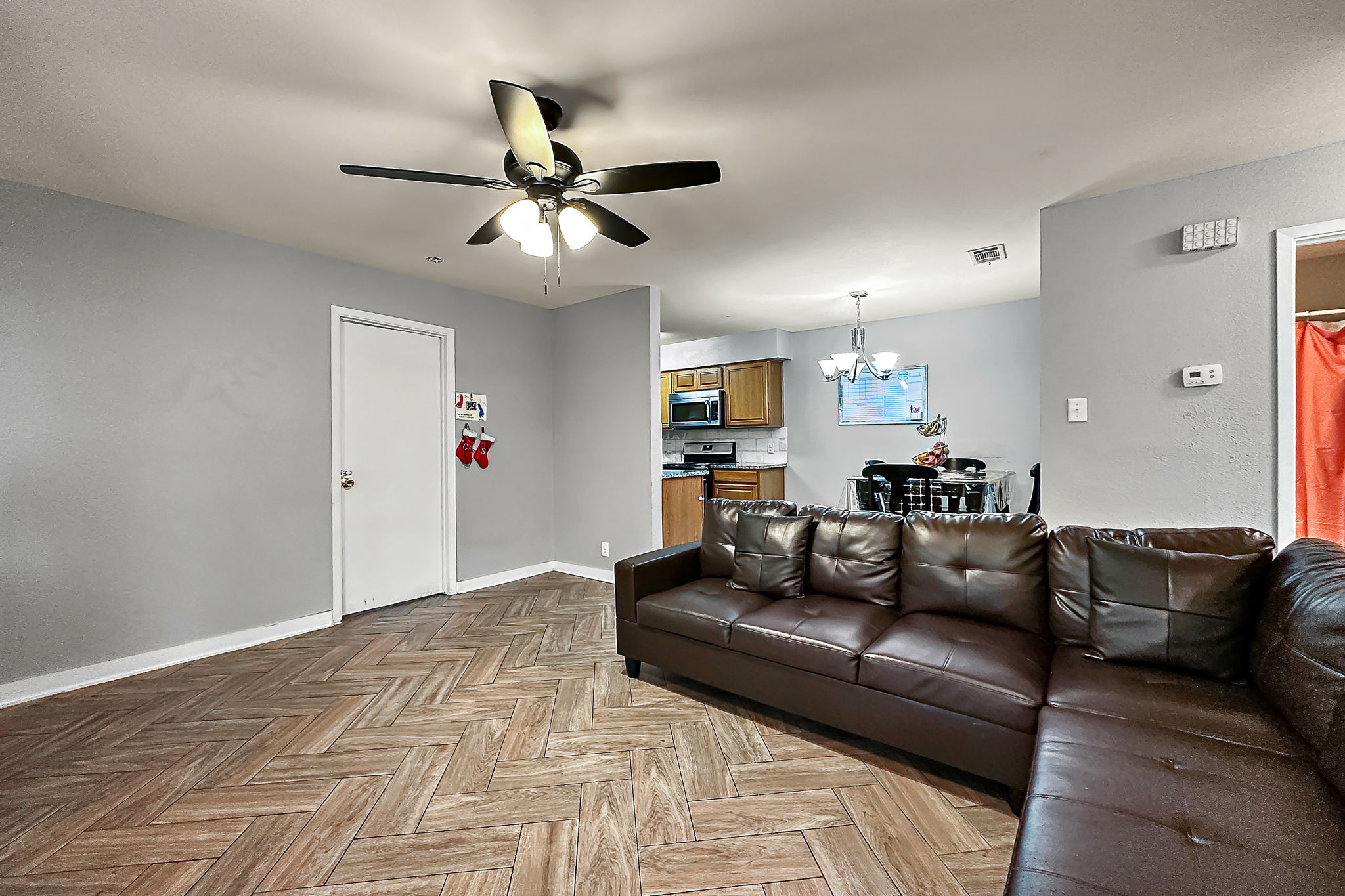 700 Misty Morning Way Round Rock, TX 78664 - Photo 24 of 36 Unit A - Living space leading to the dining area and kitchen.