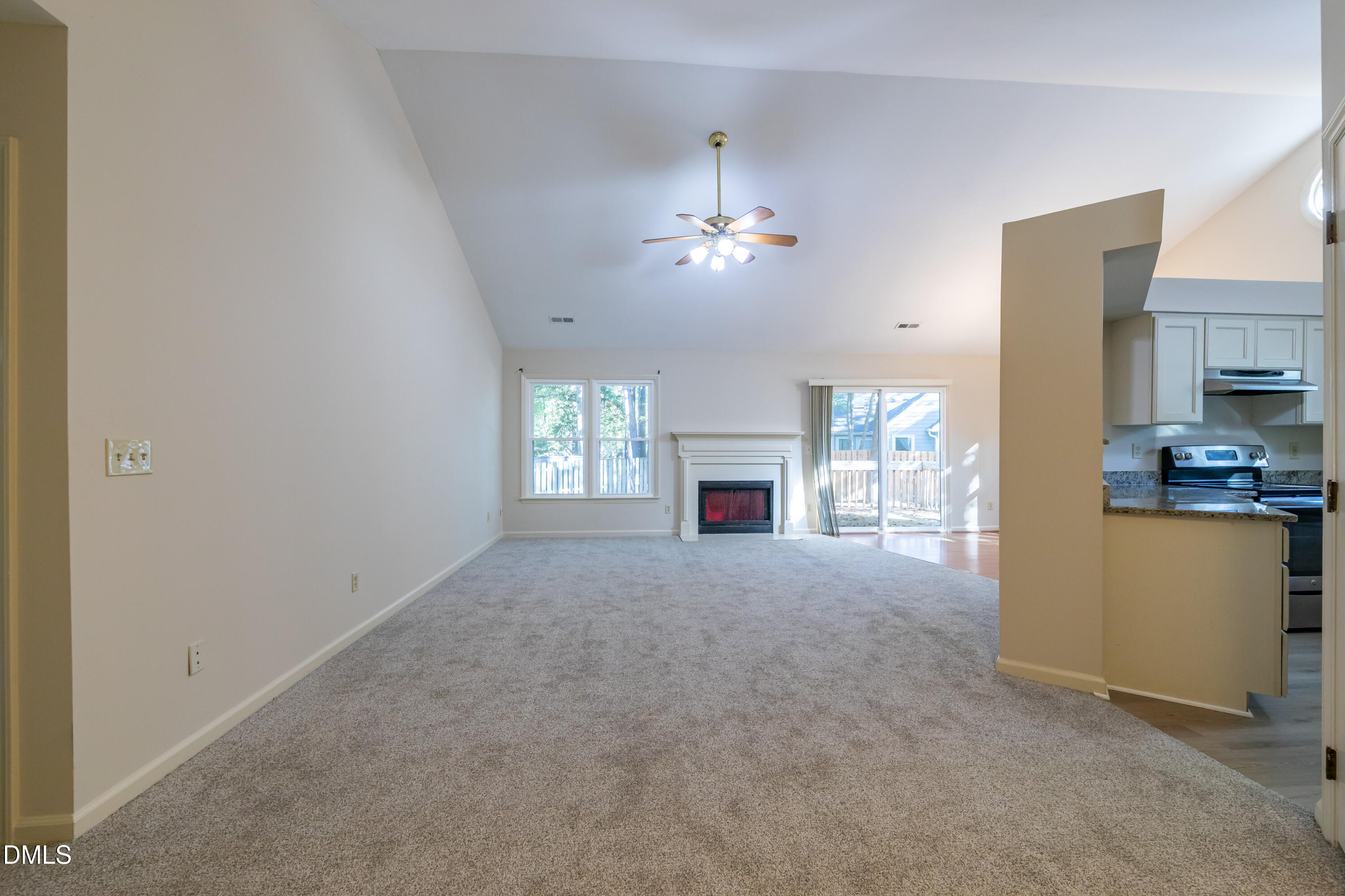 3609 Singleleaf Lane Raleigh, NC 27616 - Photo 2 of 41 a view of a kitchen with furniture and a fireplace