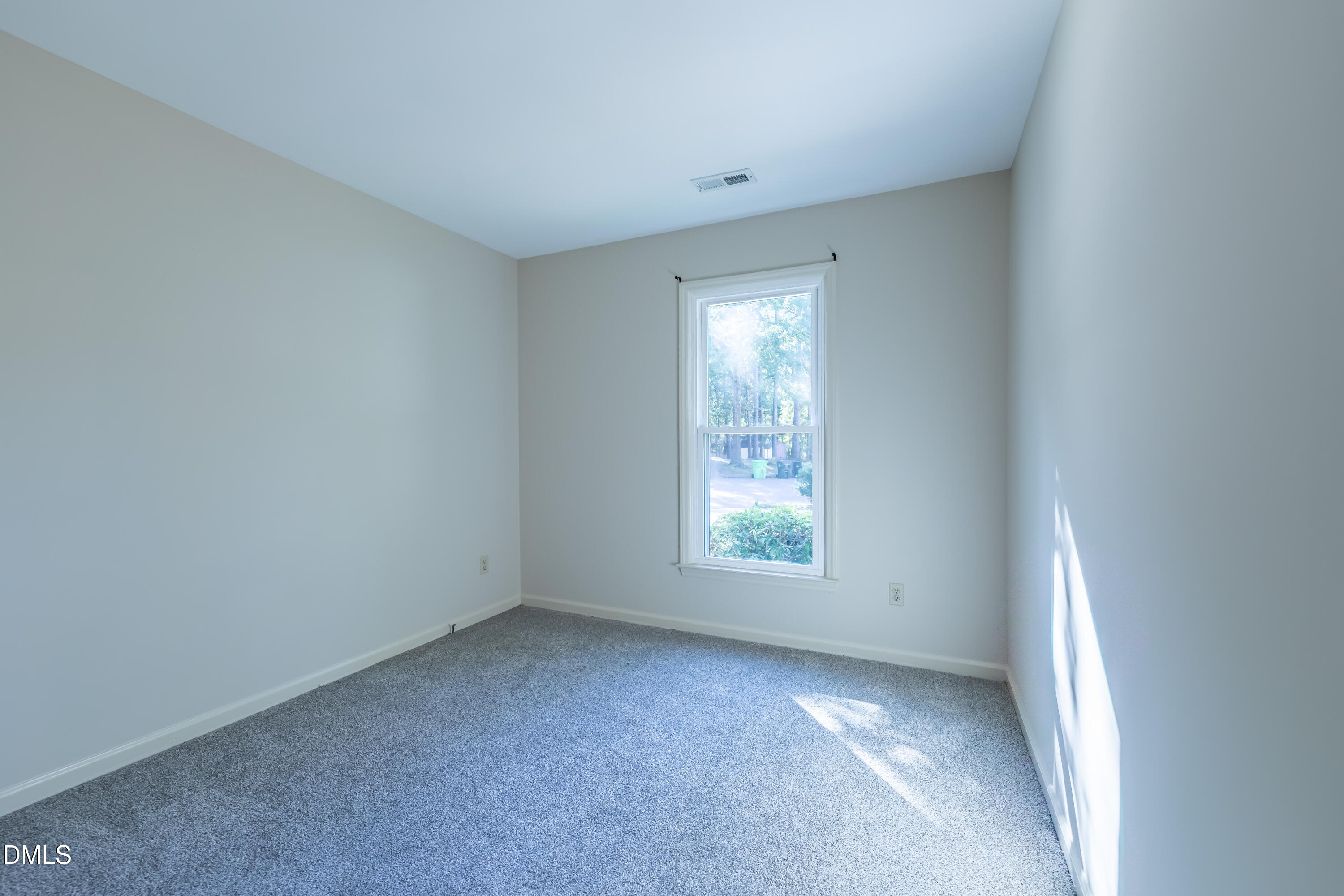 3609 Singleleaf Lane Raleigh, NC 27616 - Photo 23 of 41 an empty room with windows