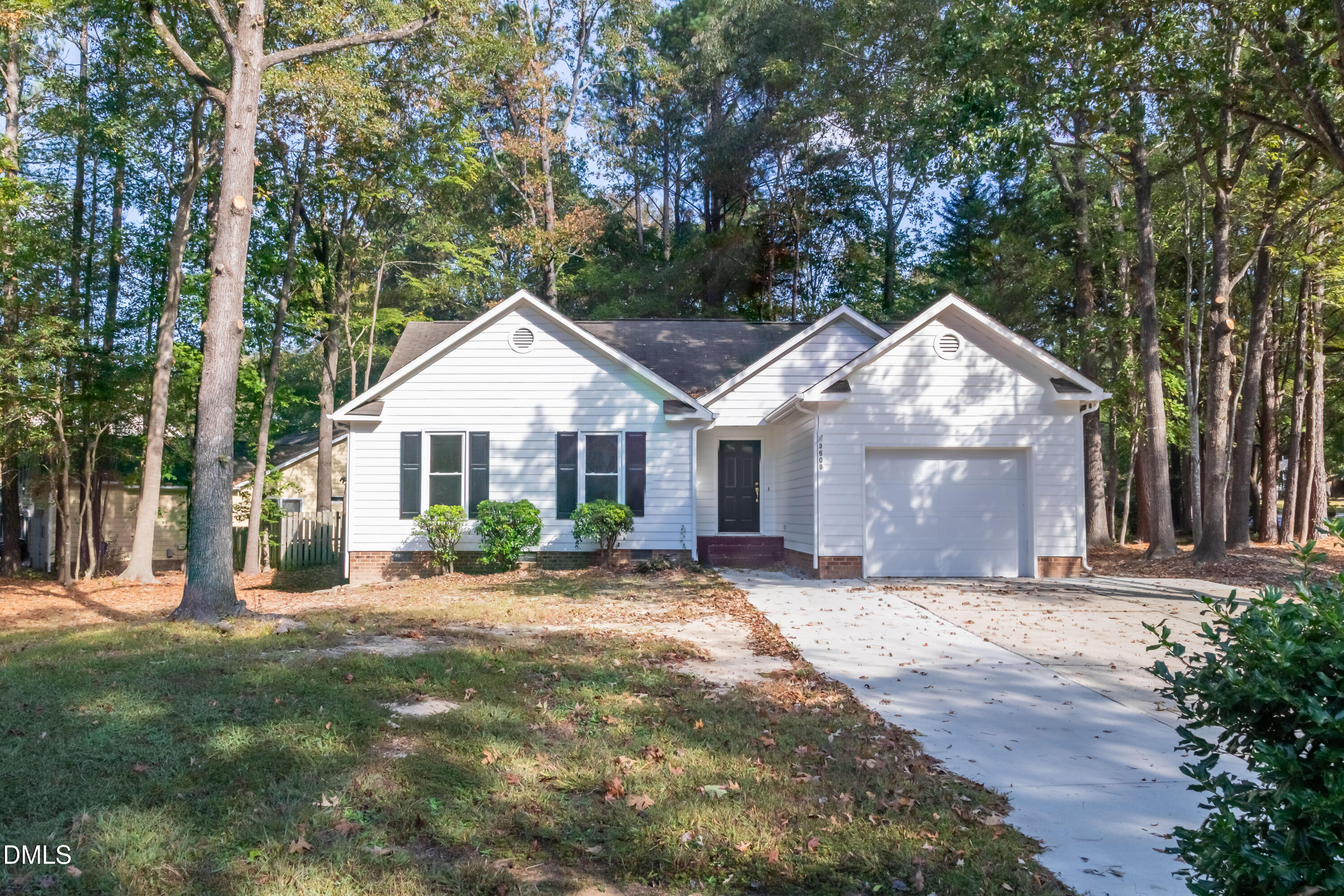 3609 Singleleaf Lane Raleigh, NC 27616 - Photo 34 of 41 a view of a house with yard and a garden
