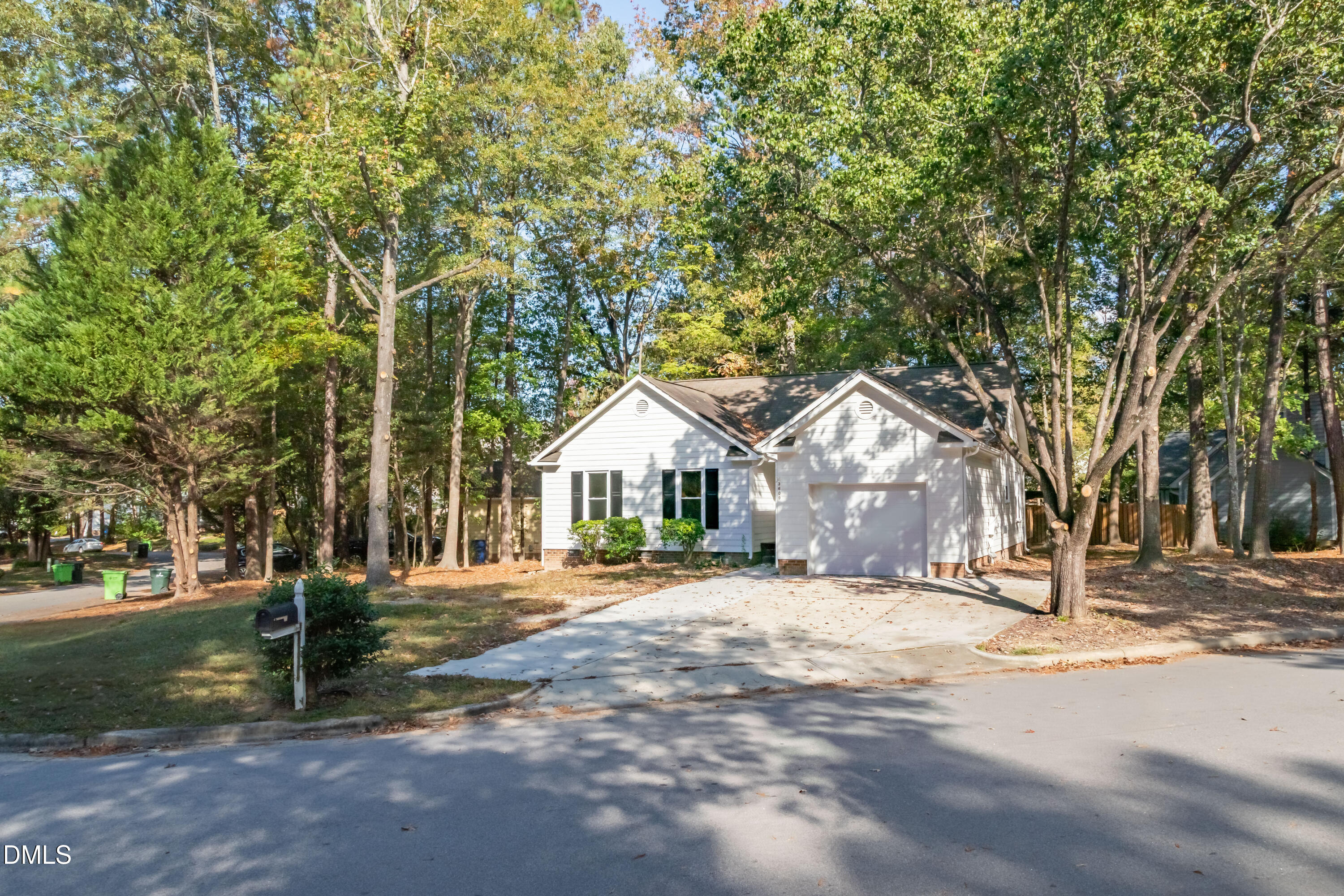3609 Singleleaf Lane Raleigh, NC 27616 - Photo 36 of 41 a front view of a house with a yard and trees