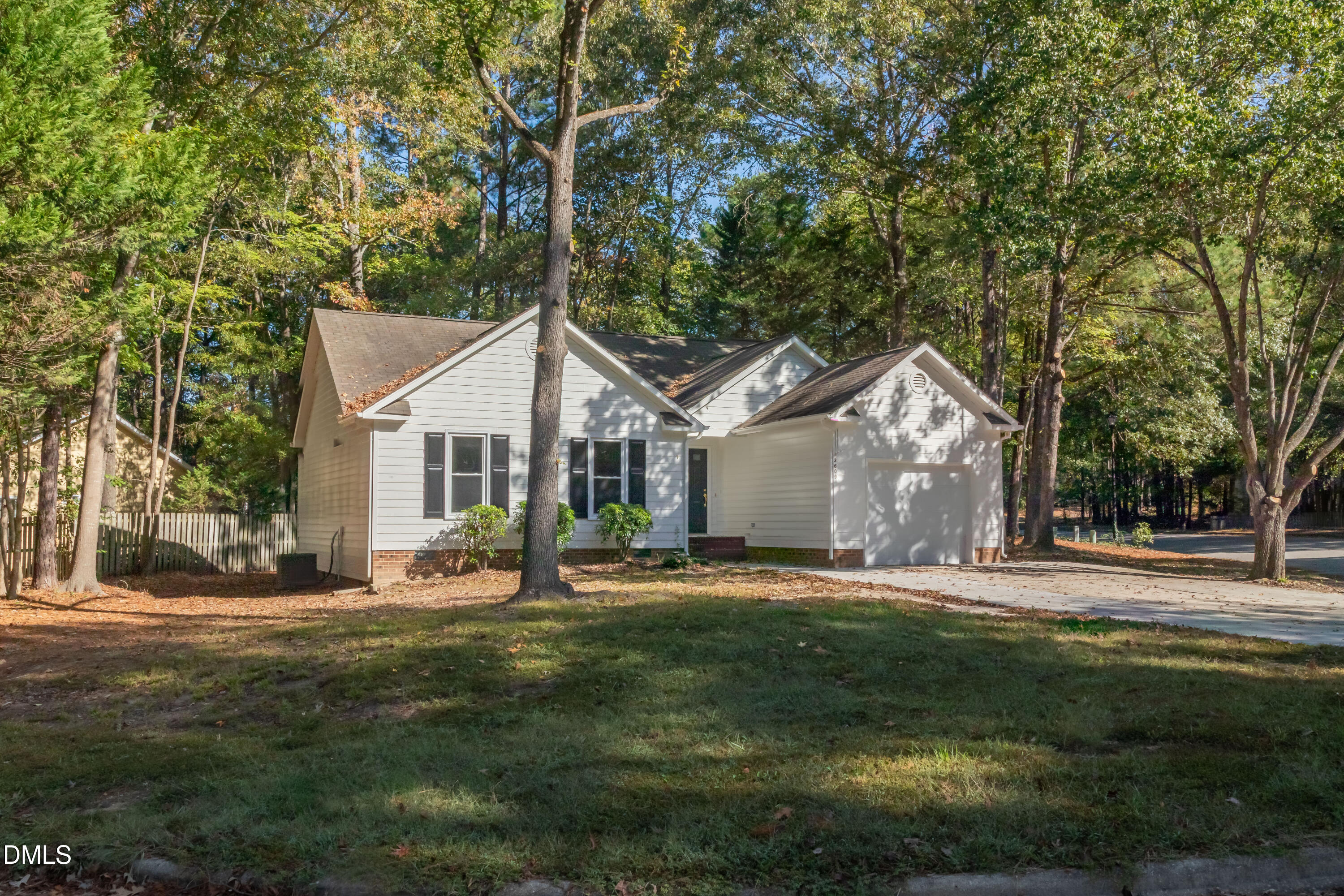 3609 Singleleaf Lane Raleigh, NC 27616 - Photo 38 of 41 a front view of a house with a yard