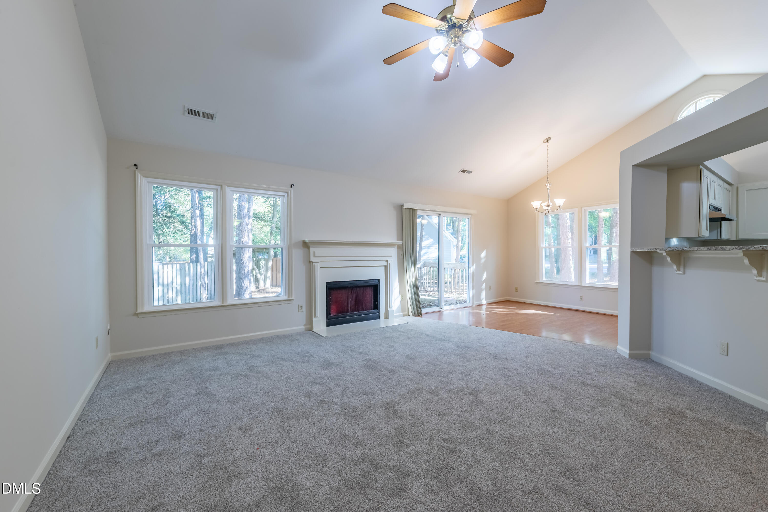 3609 Singleleaf Lane Raleigh, NC 27616 - Photo 4 of 41 a view of empty room with window and fireplace