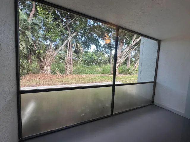 a view of a large window with an outdoor view