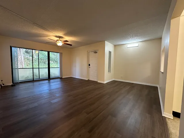 a view of livingroom with hardwood floor and window