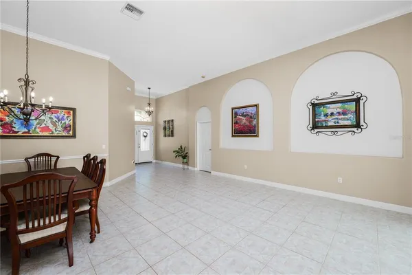 a view of a dining room with furniture