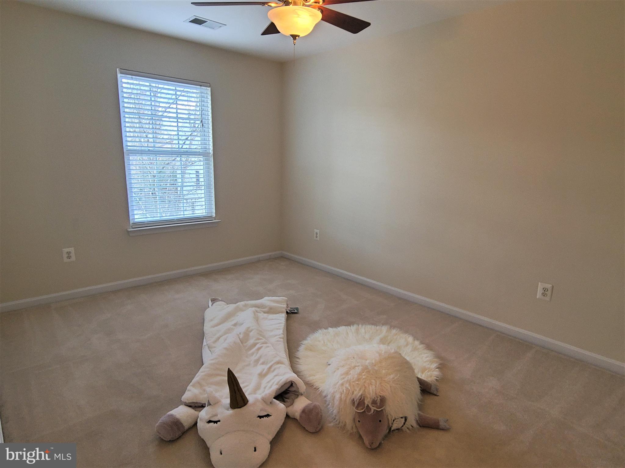 164 Tilden Way, Unit 164 Edgewater, MD 21037 - Photo 19 of 34 an empty room with windows