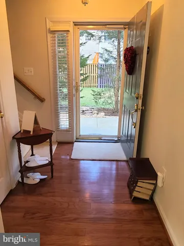 a view of a door and a window