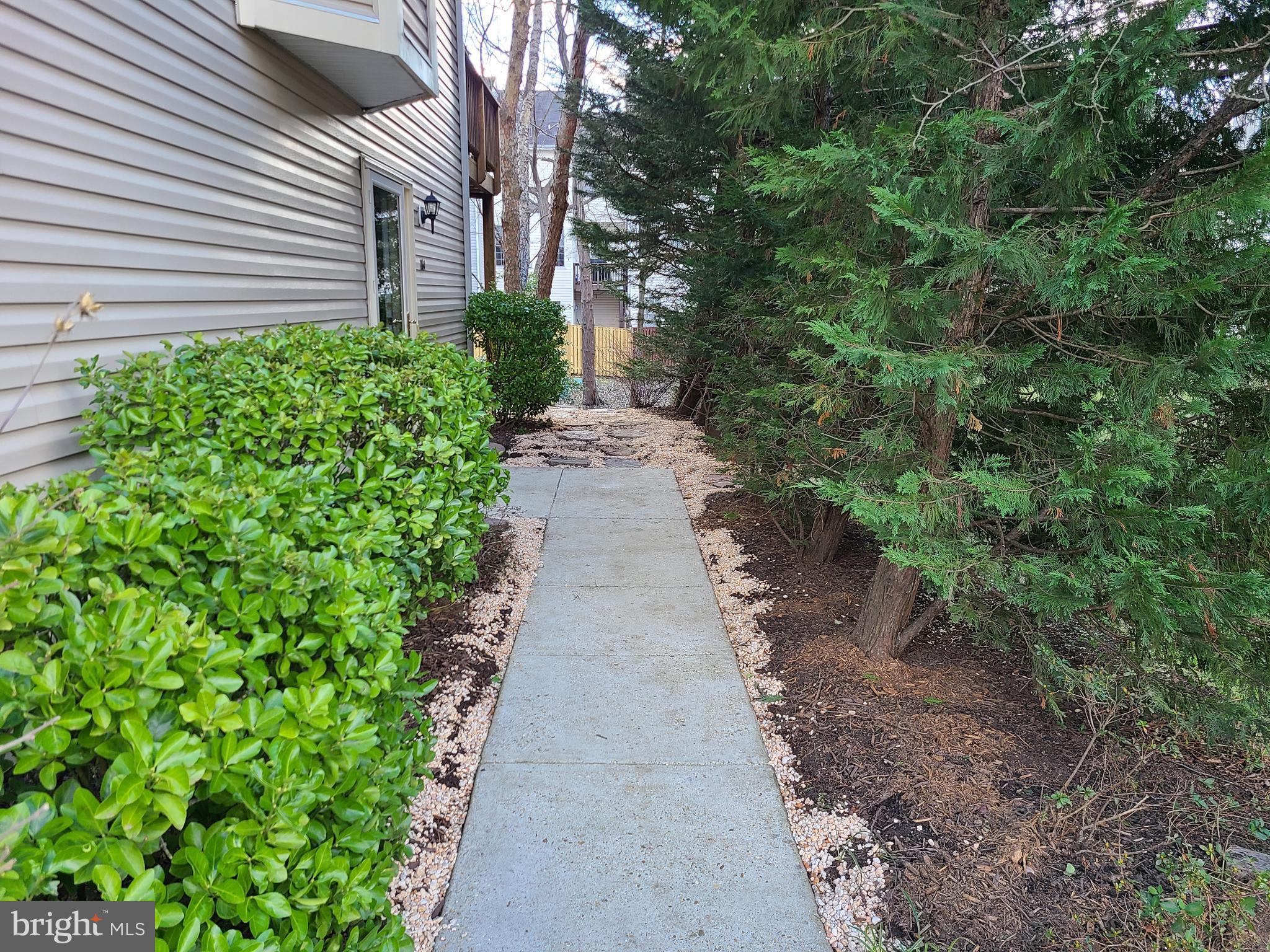 164 Tilden Way, Unit 164 Edgewater, MD 21037 - Photo 30 of 34 a view of a pathway with a house
