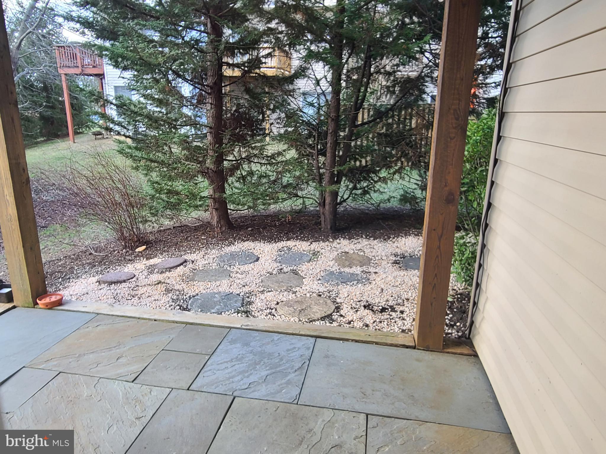 164 Tilden Way, Unit 164 Edgewater, MD 21037 - Photo 33 of 34 a view of backyard path with trees in the background