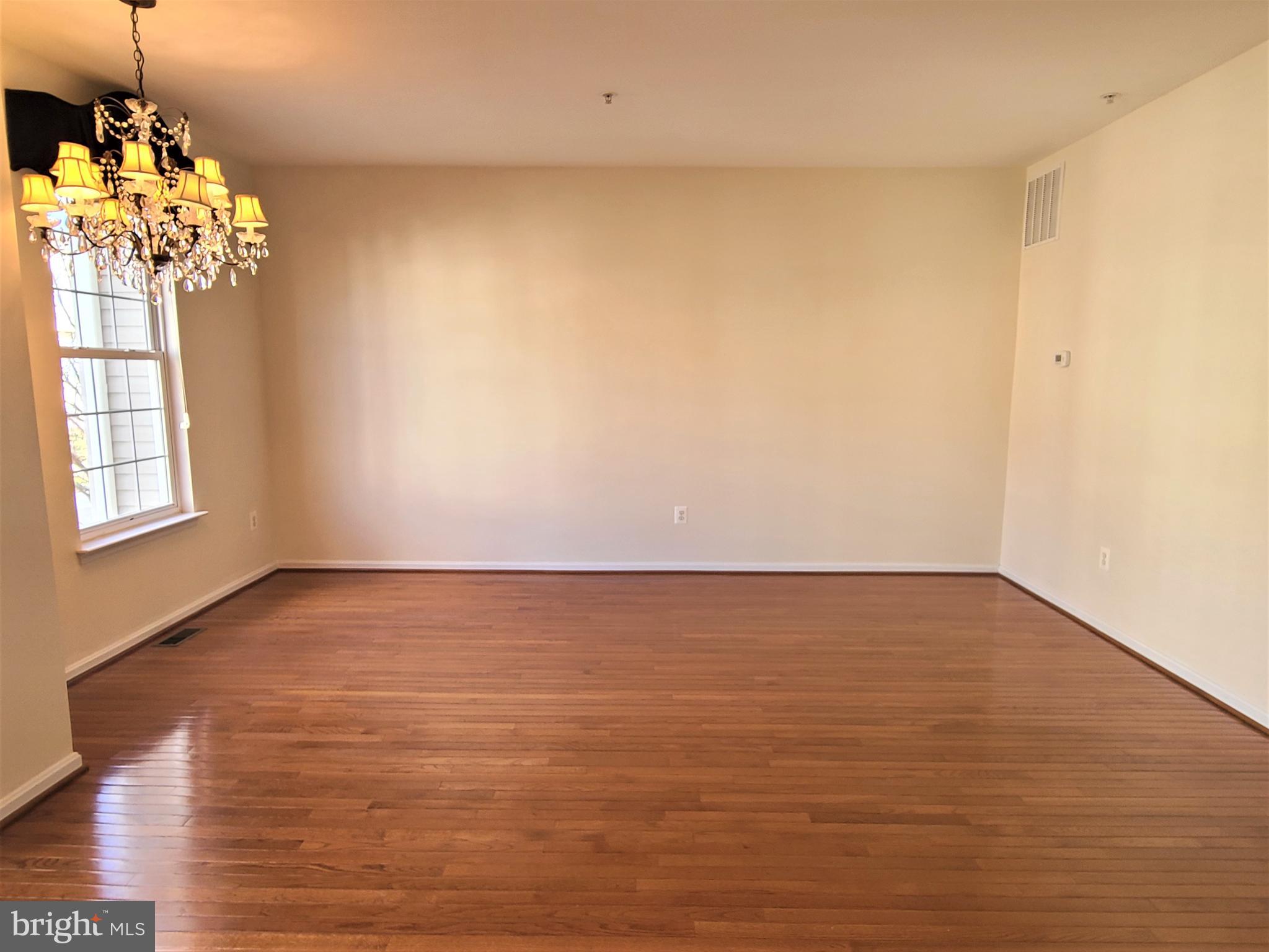 164 Tilden Way, Unit 164 Edgewater, MD 21037 - Photo 4 of 34 a view of an empty room with window