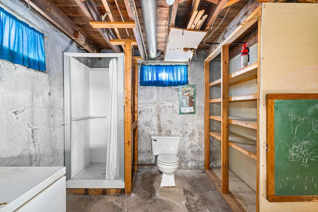 434 12th Street Cloquet, MN 55720 - Photo 12 of 22 Full bathroom with concrete floors and a stall shower