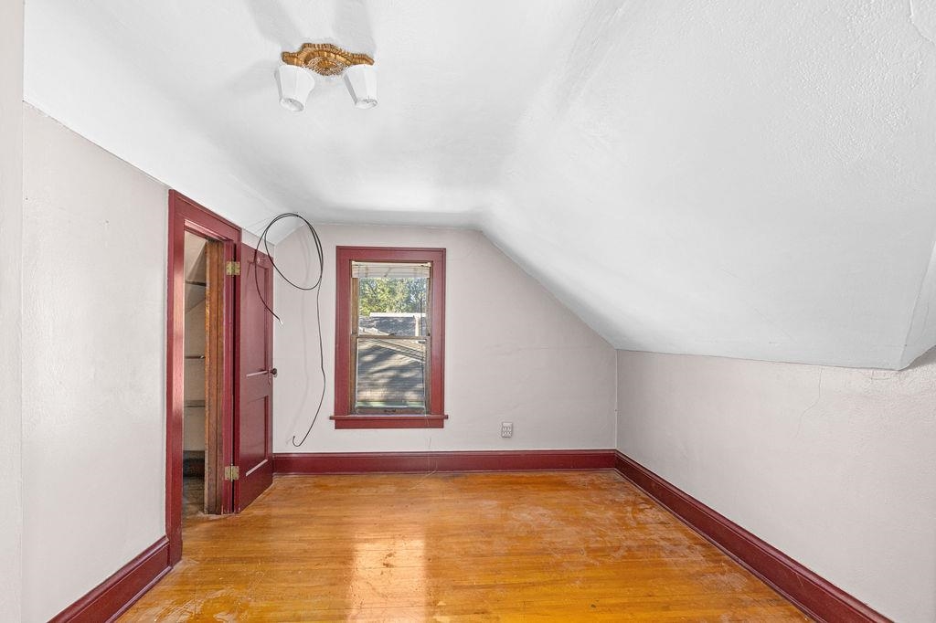 434 12th Street Cloquet, MN 55720 - Photo 16 of 22 Additional living space featuring light wood finished floors and lofted ceiling