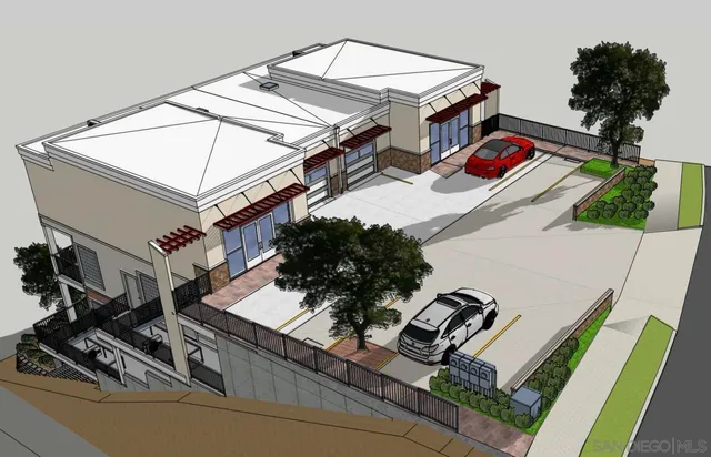 a view of a couches with wooden floor